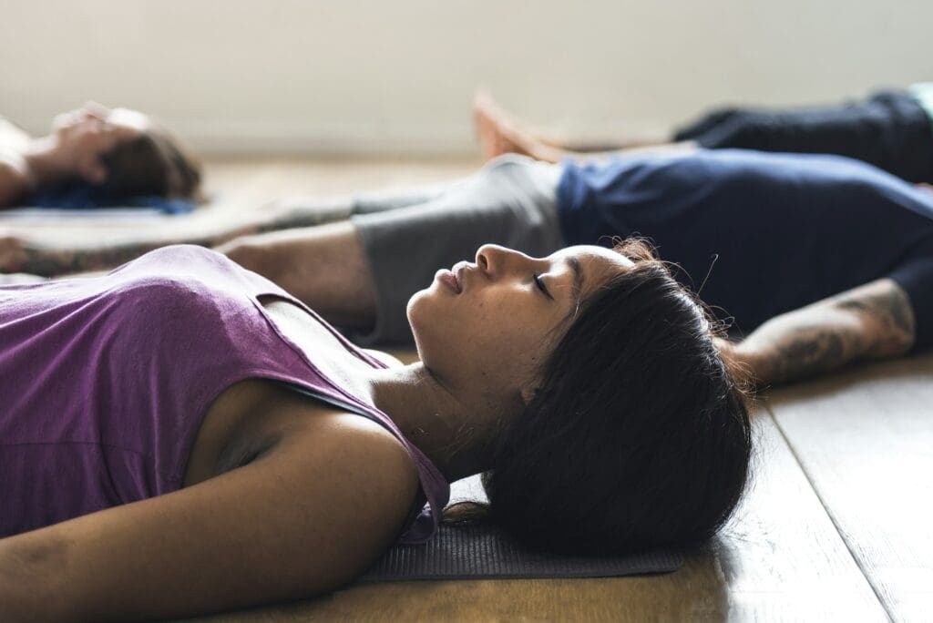 Group of diverse people are joining a yoga class